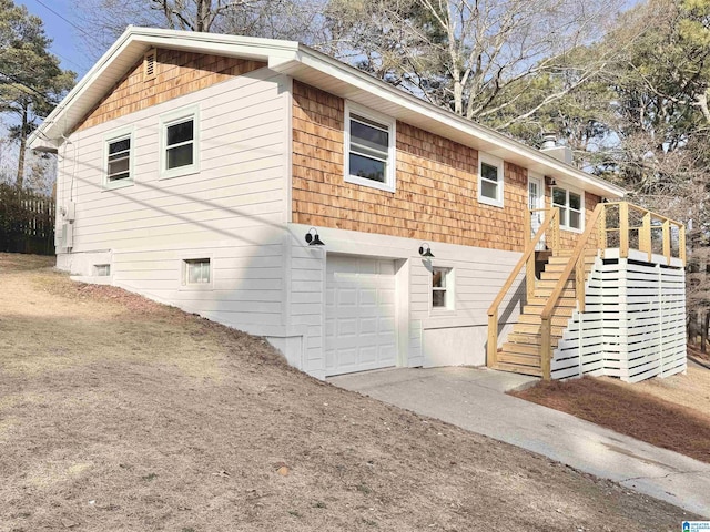 view of side of property featuring a garage