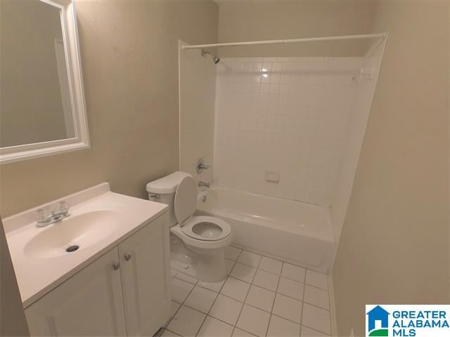 2838 Micmac Dr, Birmingham, AL 35215 - bathroom featuring vanity, toilet, tub / shower combination, and tile patterned flooring