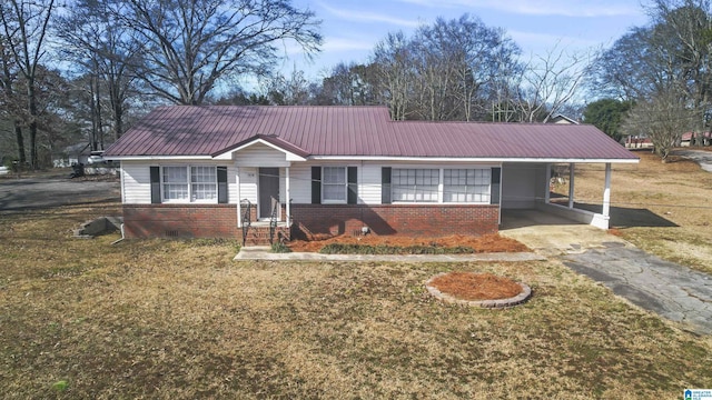 ranch-style house with a carport and a front yard