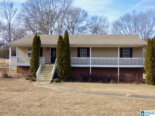 view of front of property featuring covered porch