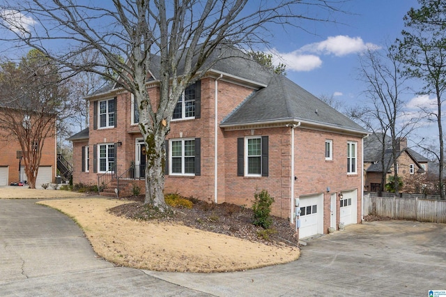 view of side of home with a garage