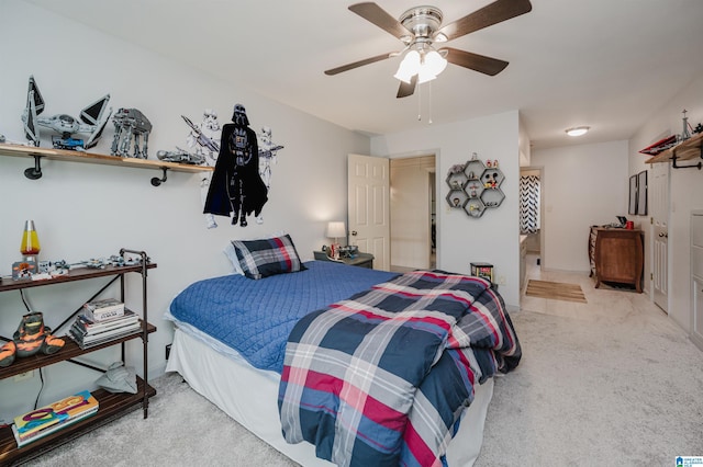 bedroom with light carpet and ceiling fan