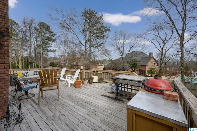 wooden terrace with grilling area