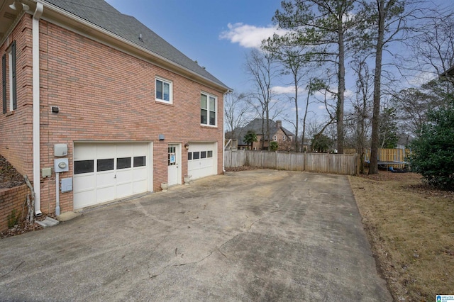 view of home's exterior with a garage