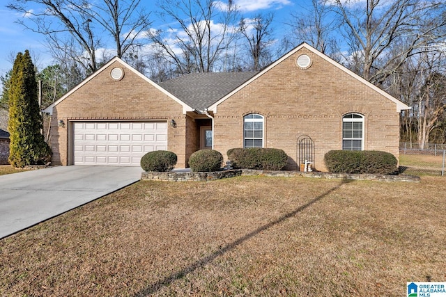 view of front facade featuring a garage and a front lawn