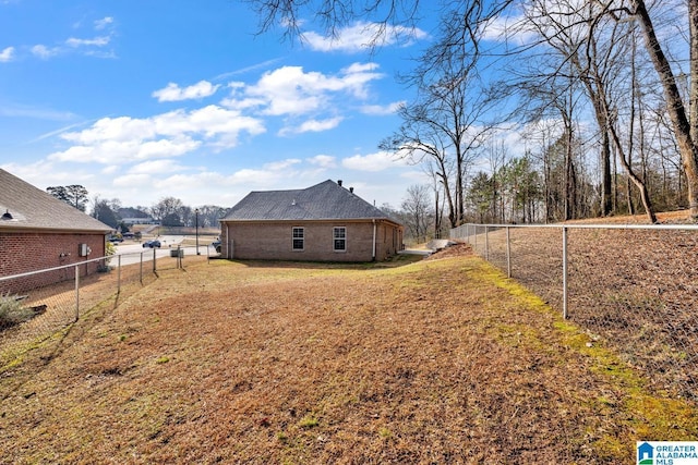 view of yard with a fenced backyard