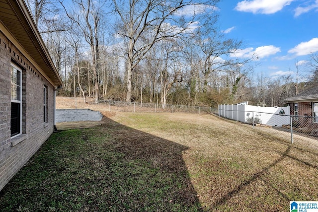 view of yard featuring a fenced backyard