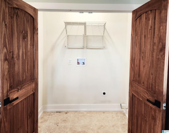 laundry area with washer hookup and electric dryer hookup