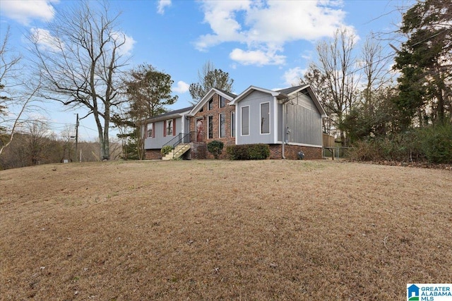 view of front of home with a front yard