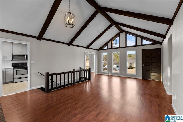 living room with beamed ceiling, wood-type flooring, high vaulted ceiling, and an inviting chandelier