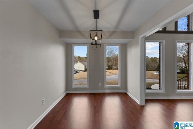 doorway featuring dark hardwood / wood-style floors