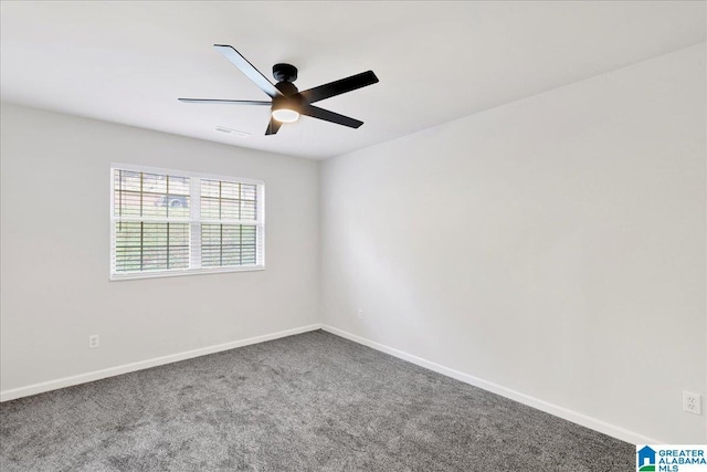 carpeted empty room featuring ceiling fan