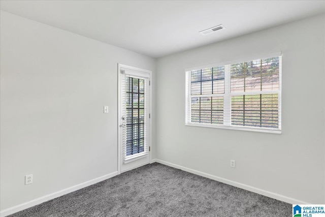 view of carpeted spare room