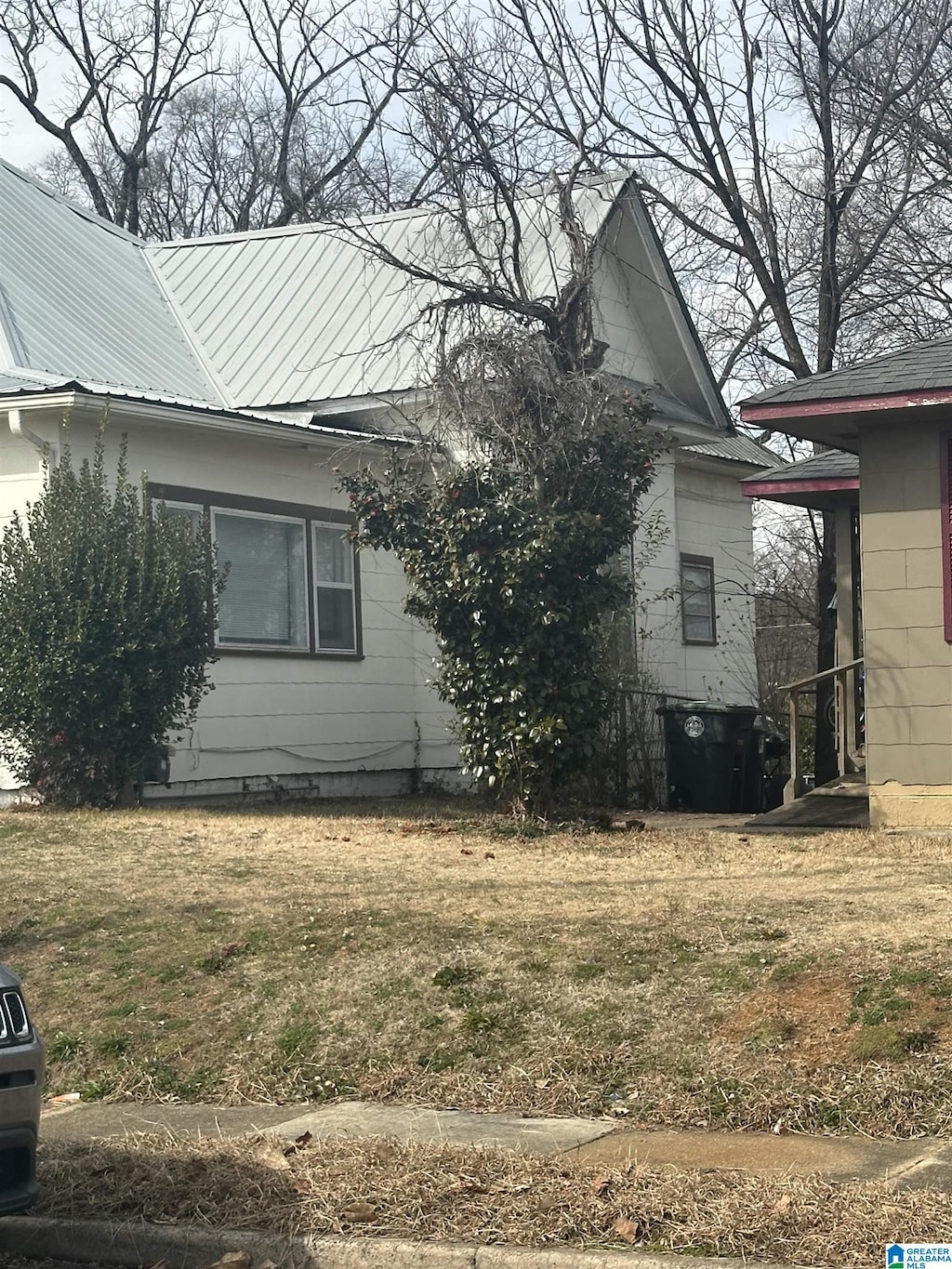 view of home's exterior featuring a yard