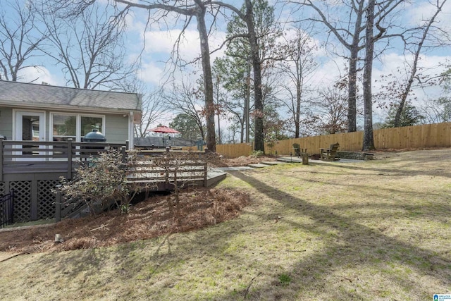 view of yard featuring a deck