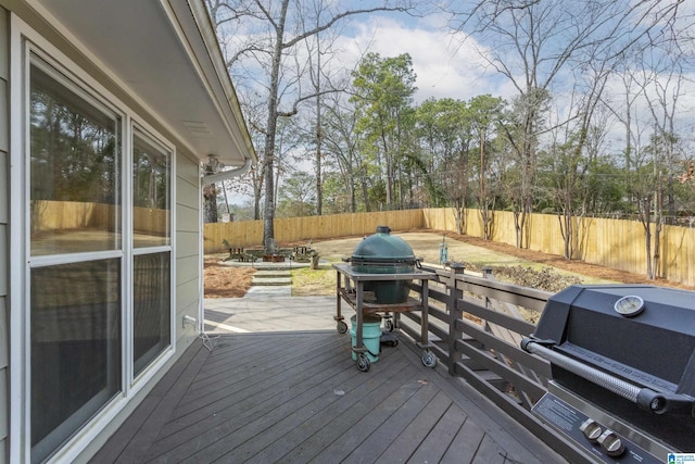 wooden terrace with area for grilling