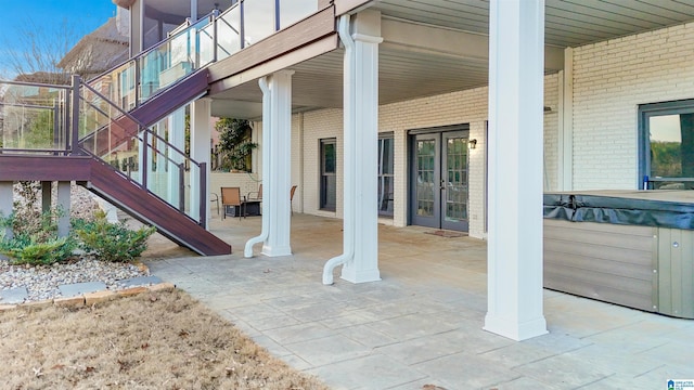 view of patio / terrace featuring a hot tub