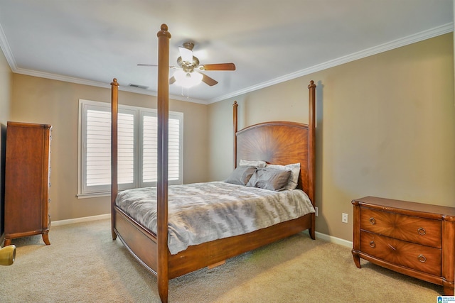 bedroom featuring crown molding, light colored carpet, and ceiling fan