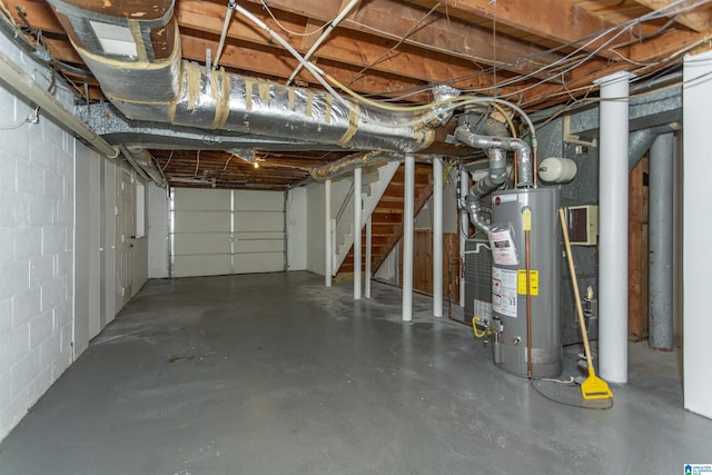 garage featuring gas water heater