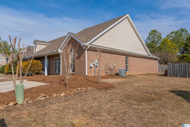 view of home's exterior featuring central AC unit