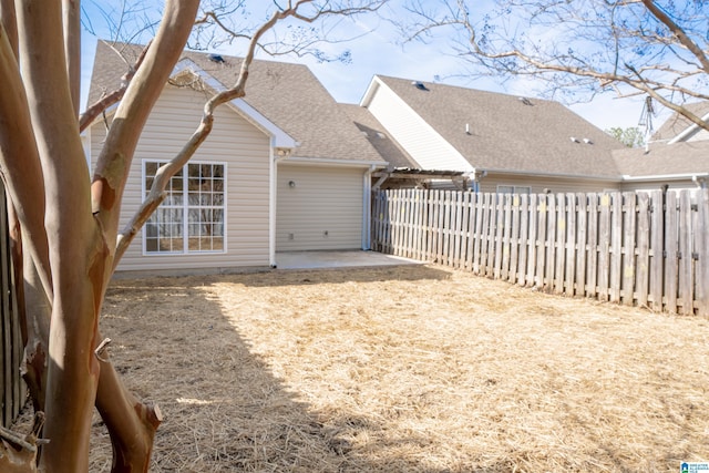 back of house with a patio area