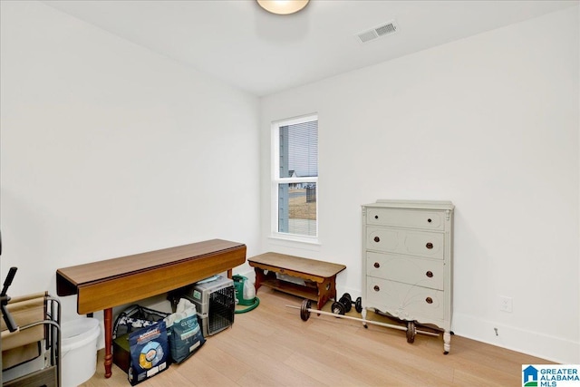 miscellaneous room with hardwood / wood-style flooring