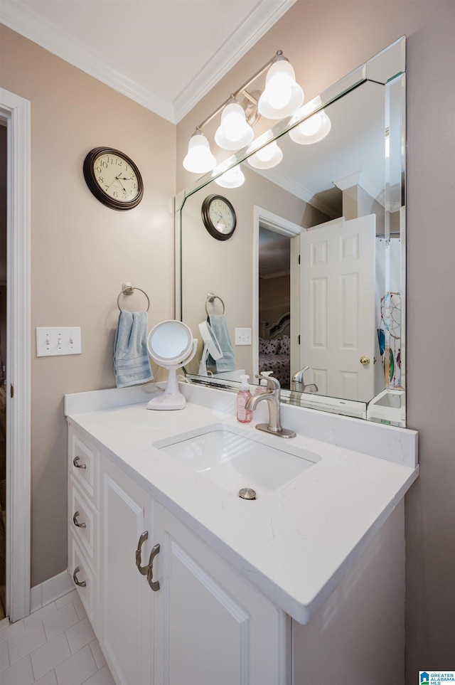 bathroom with tile patterned flooring, crown molding, and vanity