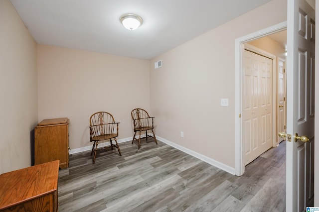 living area featuring light hardwood / wood-style floors