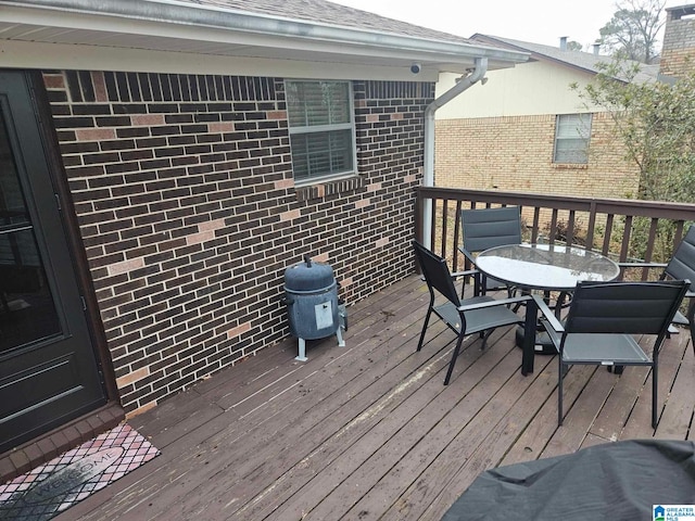 wooden terrace with grilling area