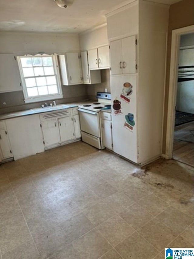 kitchen with sink, ornamental molding, white cabinets, and white range with electric stovetop