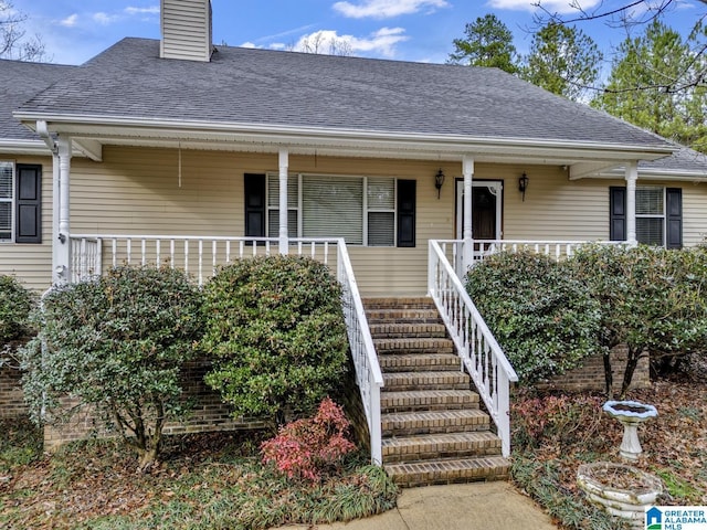 view of front of home featuring covered porch