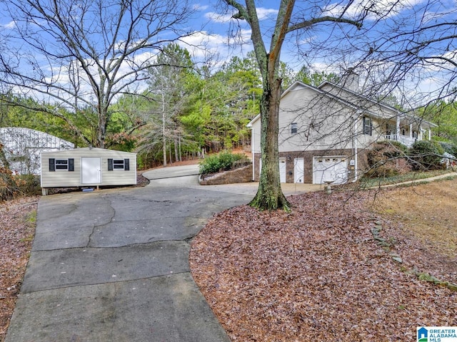 view of side of property featuring a garage