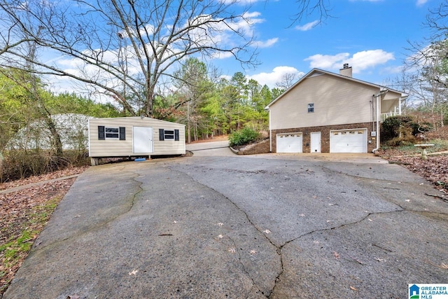 view of home's exterior with a garage