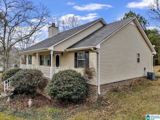 view of front of home featuring central air condition unit and covered porch