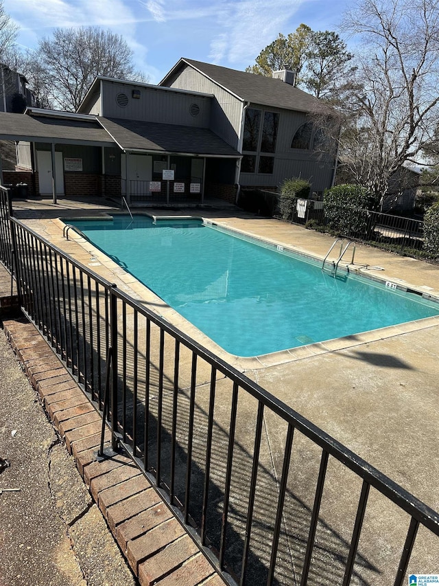 view of pool featuring a patio area