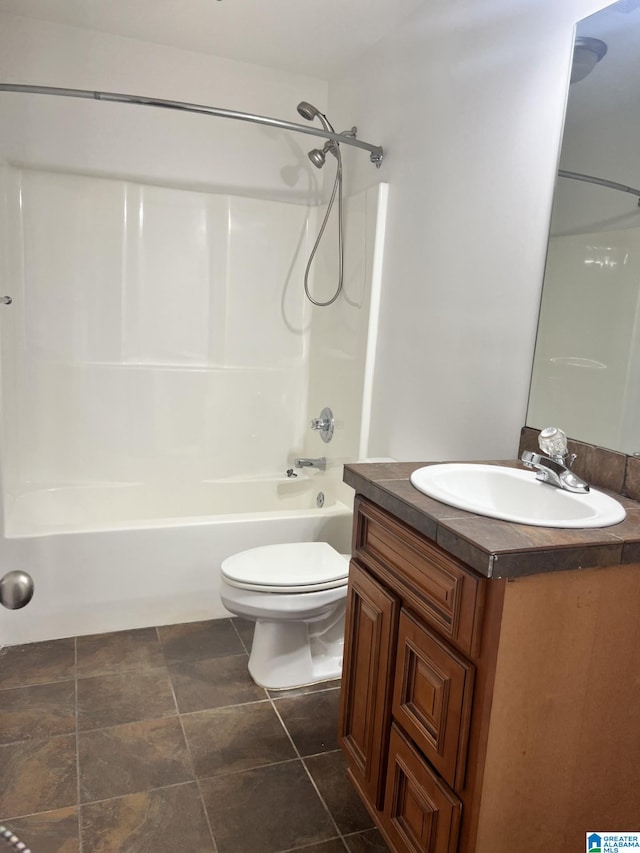 full bathroom with shower / bathtub combination, vanity, and toilet