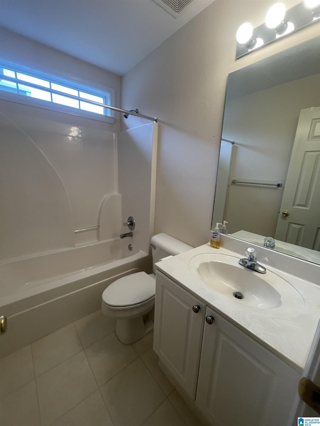 full bathroom featuring tile patterned flooring, shower / tub combination, vanity, and toilet