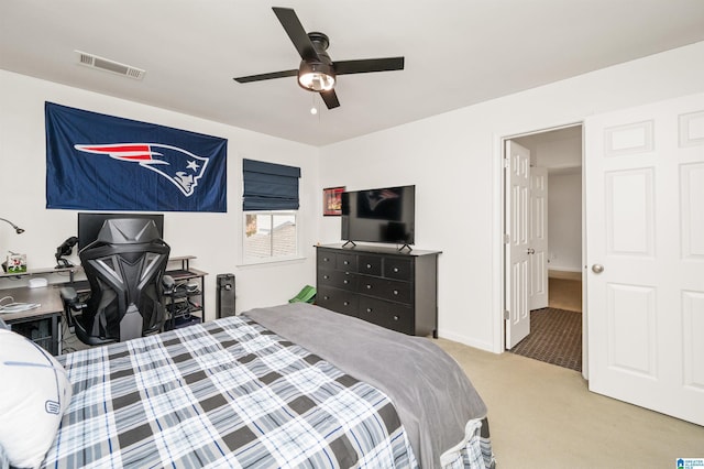 bedroom with ceiling fan and carpet flooring