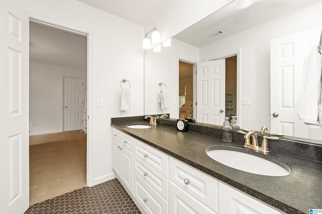 bathroom featuring tile patterned floors and vanity