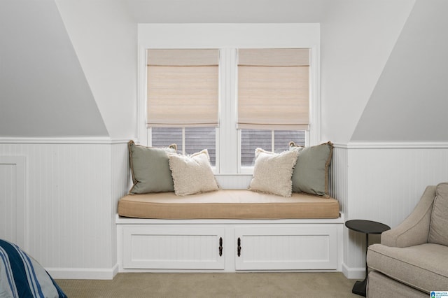 living area with light colored carpet