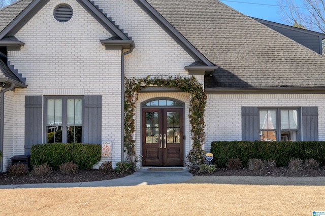 entrance to property featuring french doors