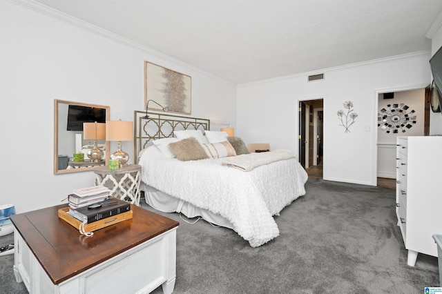 bedroom featuring dark carpet and ornamental molding