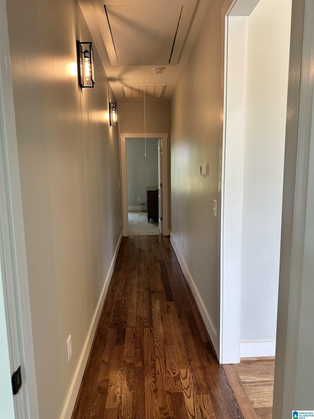 hall featuring dark wood-type flooring