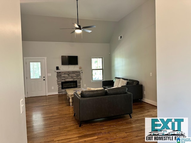 living room featuring ceiling fan, high vaulted ceiling, dark hardwood / wood-style floors, and a fireplace