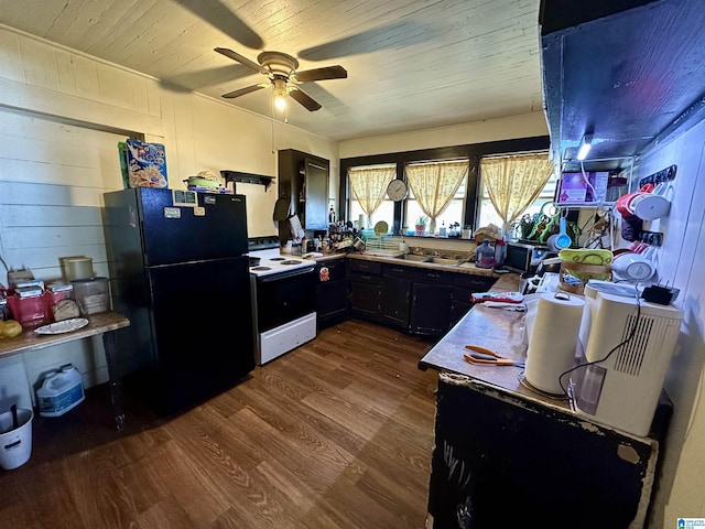 kitchen featuring black refrigerator, wood-type flooring, range with electric cooktop, and wooden ceiling