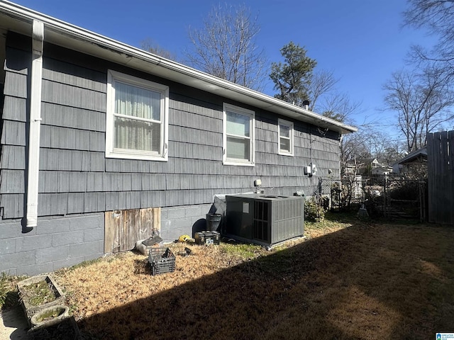 view of property exterior with cooling unit