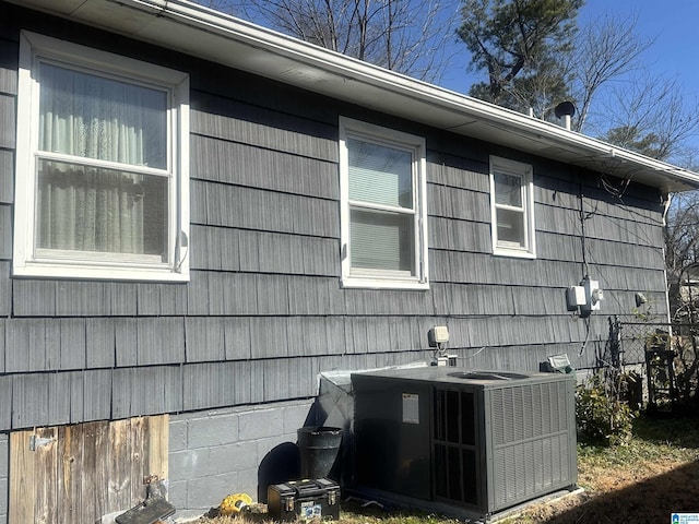 view of home's exterior with central air condition unit