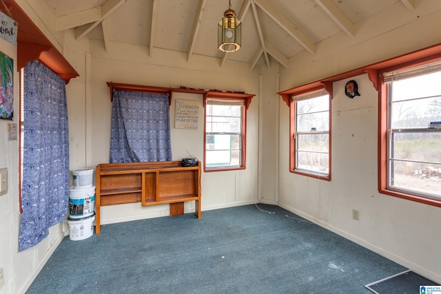 misc room featuring lofted ceiling with beams and carpet flooring