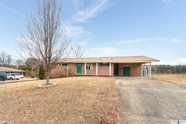 ranch-style house with a carport