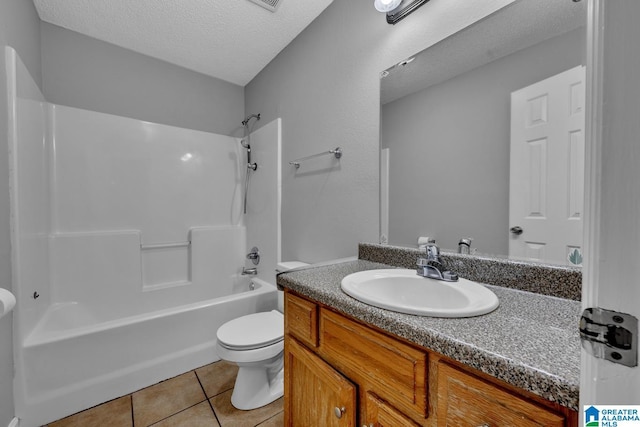 full bathroom with toilet, bathing tub / shower combination, a textured ceiling, vanity, and tile patterned flooring